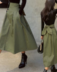 Solid Color Elegance: Slimming High-Waist Skirt with Bow Detail