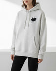 Gray hoodie with a black cat design on a fur background