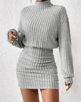 Gray ribbed knit dress worn by a person on a white background
